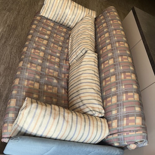 Two-Seater Sofa Bed used, practical and space-saving