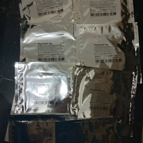 Coloplast adhesive dressings pack of 8, new, 2 pieces missing