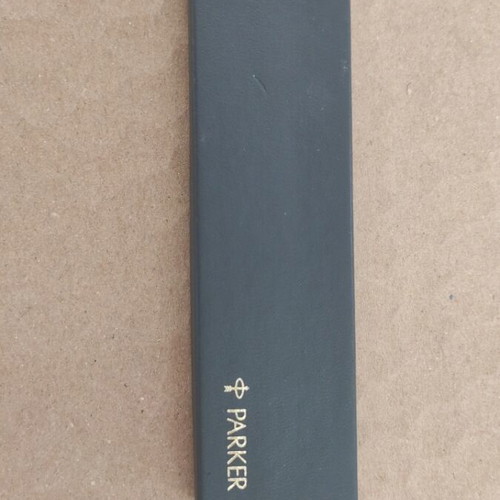 Parker pen used, silver with gold