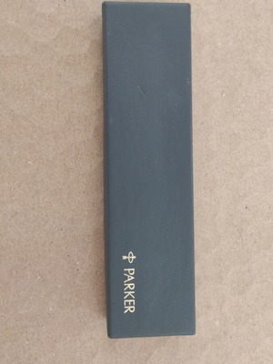 Parker pen used, silver with gold