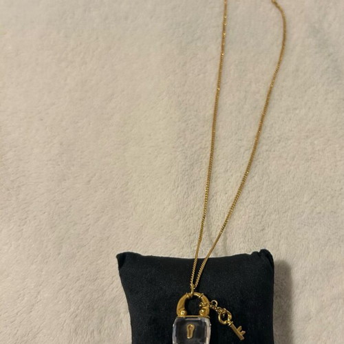 Swarovski necklace vintage like new with lock and key