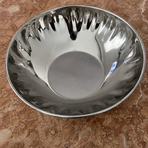 Metal serving bowl with gold handles
