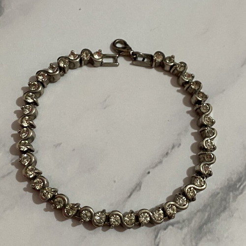 Bracelet with rhinestones used, silver color