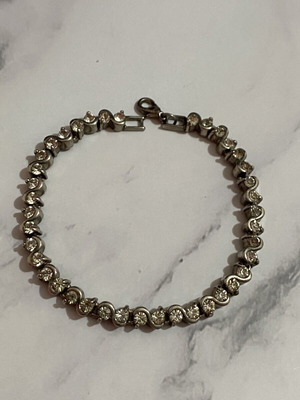 Bracelet with rhinestones used, silver color