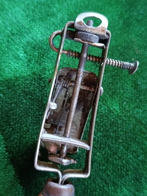 Vintage mechanical flint gas lighter with wooden handle