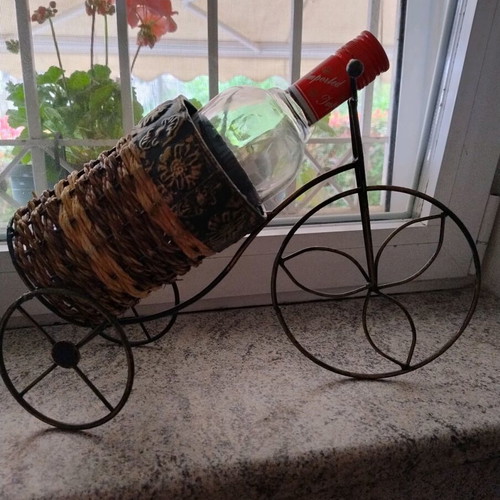 Decorative bottle holder like new