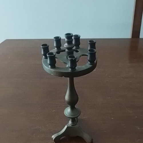 Bronze old candleholder like new, small with eight thin holes, 21 cm