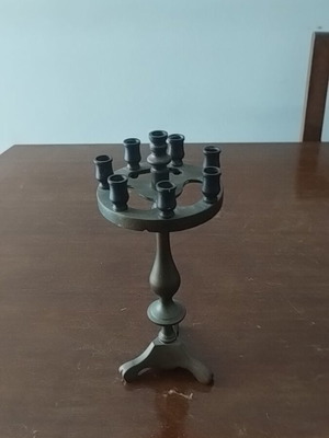 Bronze old candleholder like new, small with eight thin holes, 21 cm