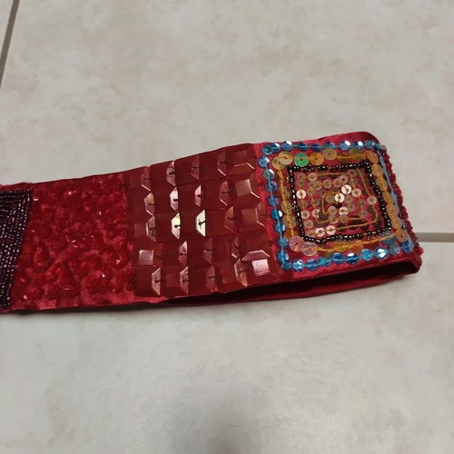 Embroidered handmade belt in burgundy red, adjustable with scratch