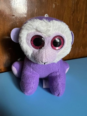 Plush monkey toy used
