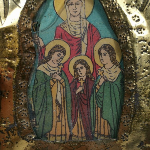 Old metal icon of Saint Sophia with the three daughters used