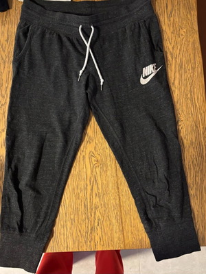 Nike unisex tracksuit used, charcoal color, size M