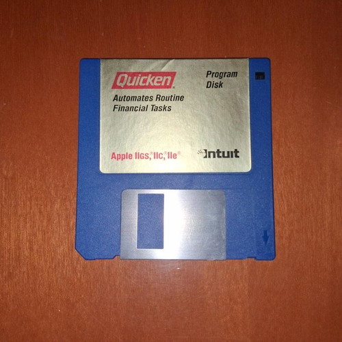 Quicken Program Disk and User's Manual used for Apple IIGS, IIc, IIc Plus, IIe