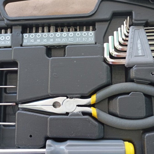 Tool set new with screwdrivers, pliers, scissors and case