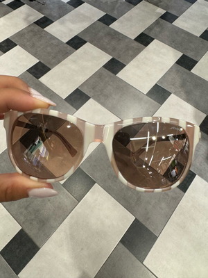 Sting sunglasses used, pink and white striped acetate with silver frame