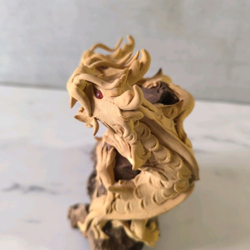 Wooden carved dragons used on wooden base