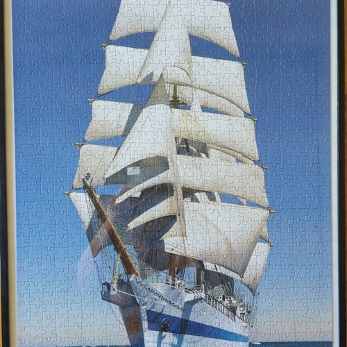 Puzzle in frame like new, dimensions 0.53x0.73 m