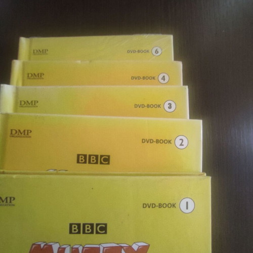 Muzzy language learning books used, pack of 5 books and 3 DVDs