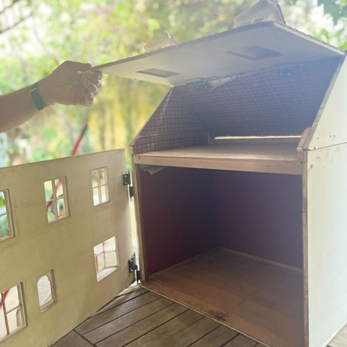 Vintage wooden dollhouse used with unique architecture