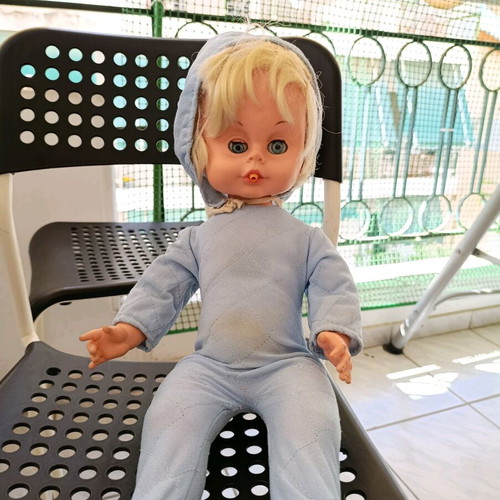 Vintage baby doll used with missing parts and wear