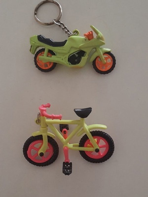 Vintage motorcycle and bicycle keychains used, colorful