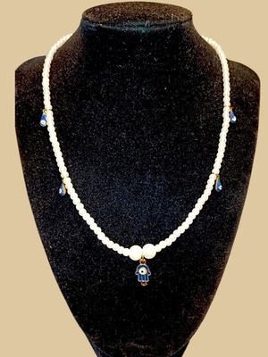 Handmade Hamsa hand necklace with evil eyes and white pearls new