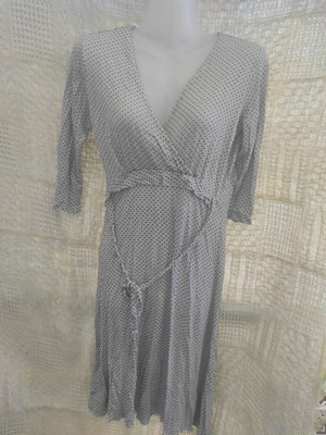 Light Elegant Dress with Draped Croisé Details and Waist Belt used