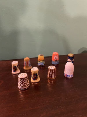 Set of 9 porcelain thimbles like new, collectible
