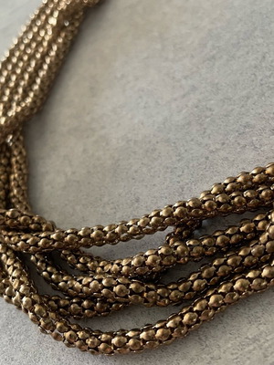 Women's necklace used with braided gold chains from H&M