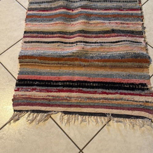 Rug used 70 cm by 2.50 m
