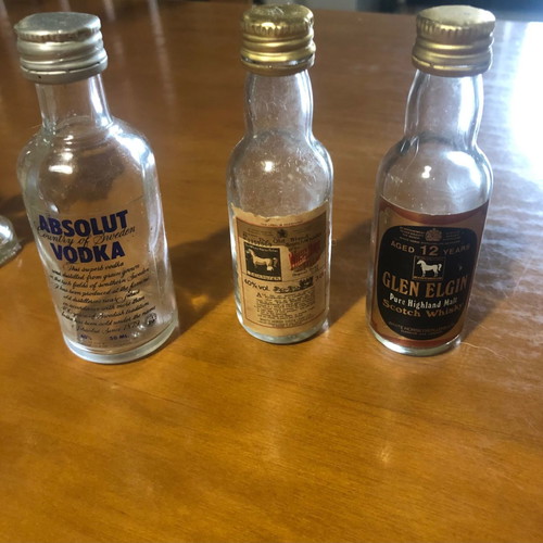 Glass miniature bottles used, pack of 7, vintage spirit collection