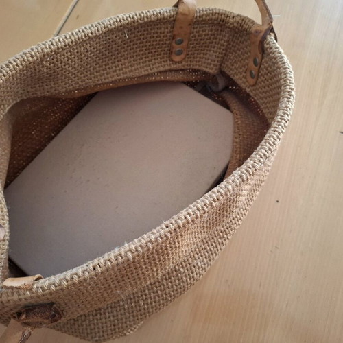 Woven magazine holder with wheels used