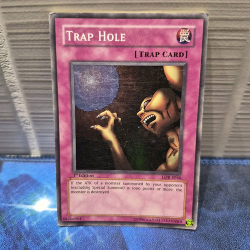 Yu-Gi-Oh! Trap Hole LOB-E046 1st Edition Super Rare card like new