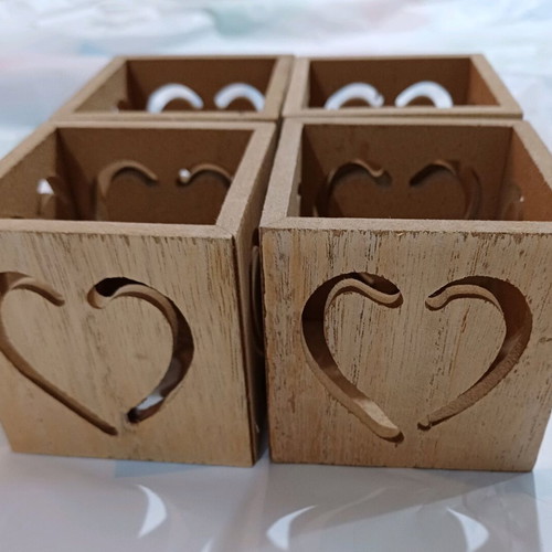 Wooden candlesticks used, set of 4 for tealight candles
