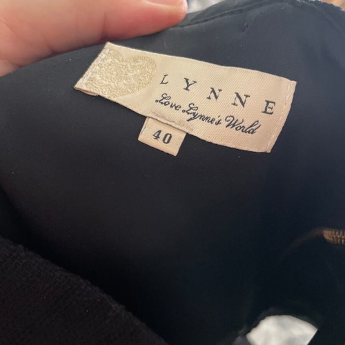 Lynne black top large with decorative buttons like new