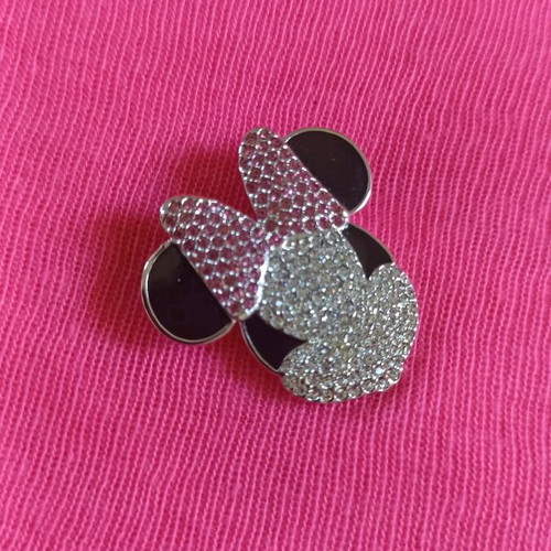 Disney x Swarovski Minnie Mouse pin like new with pink and black details