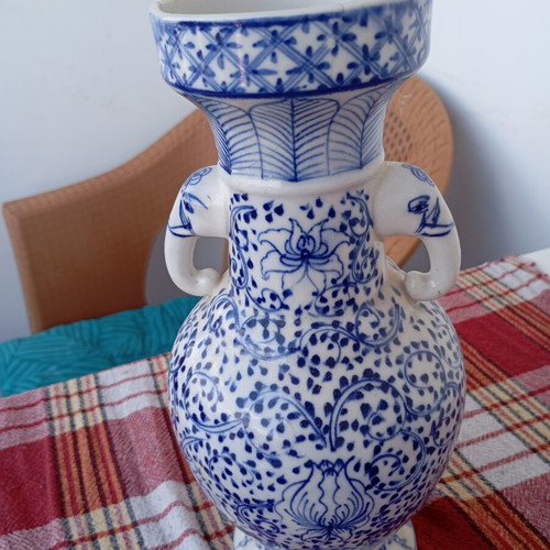 Vintage porcelain vase used, traditional Asian style blue and white Ming Qing design