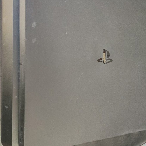 PlayStation 4 Slim like new with 2 controllers and 10 games