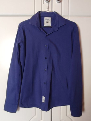 Kimmen’s blue shirt size S used with minor wear