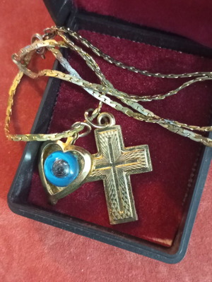 Necklace with vintage charms used, steel and gold-tone metal