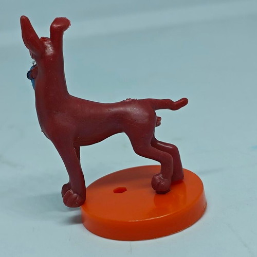 Vintage dog figure like new with orange base