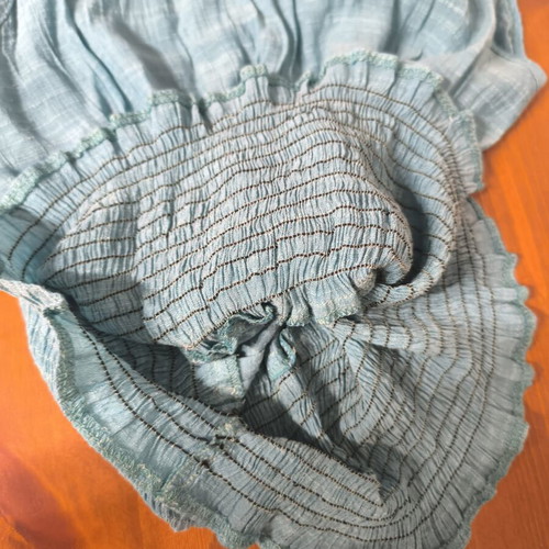 Blouse sleeveless turquoise size S used with decorative buttons