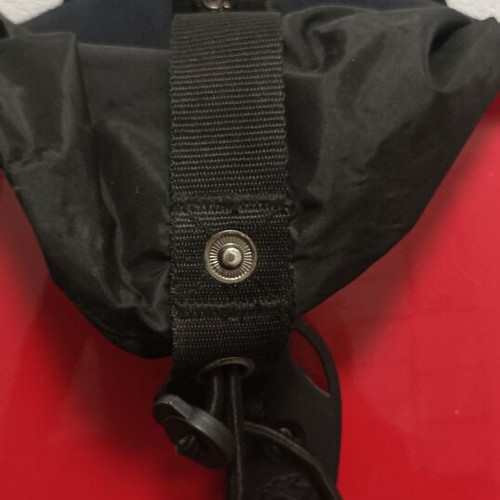 Backpack like new, red, hard shell, waterproof, carbon fiber