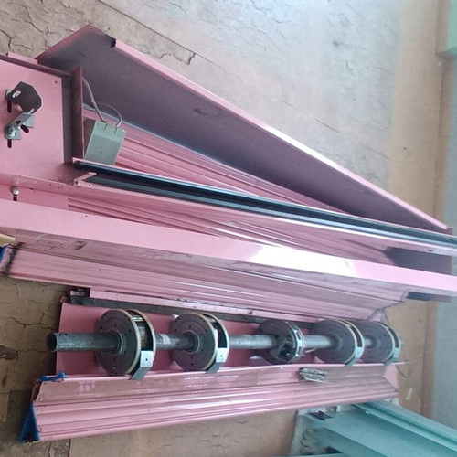 Electric garage door roller like new, fuchsia color, complete set