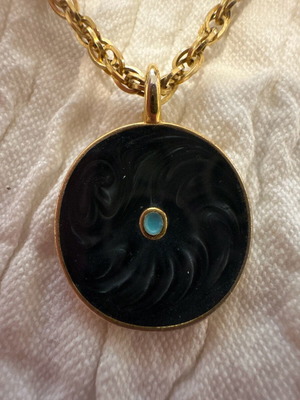 Necklace set used with black and gold beads and steel chain