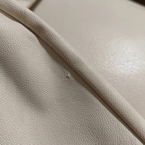 Light beige faux leather pants used with 2 small scratches