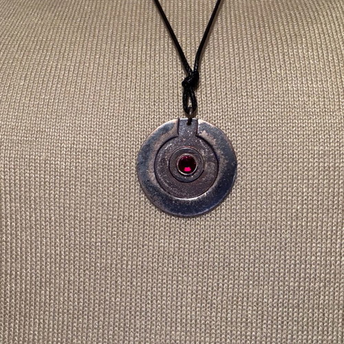 Handmade pendant like new with dark red stone and leather cord