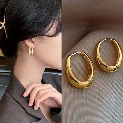 Classic copper alloy earrings gold color, new, size 24x18mm