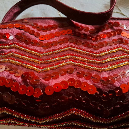 Evening satin handbag like new with burgundy sequins
