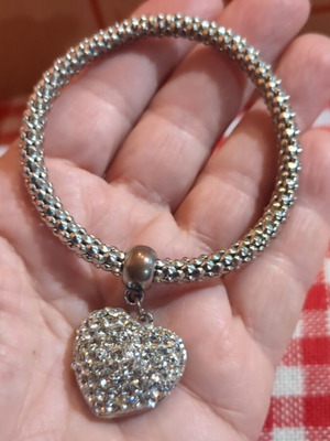 Silver elastic bracelet with rhinestones used